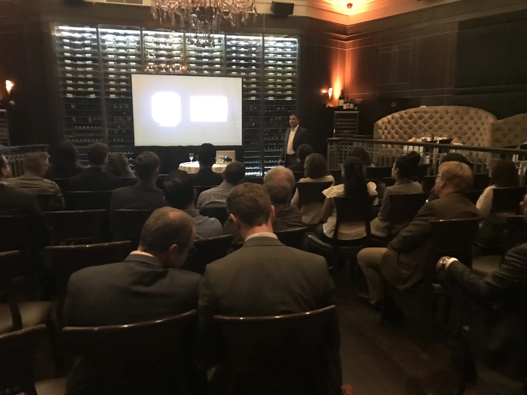 Dr. Kunal Lal presenting to an audience of dentists at a continuing-education meeting